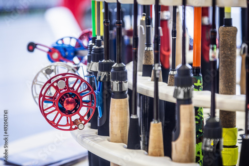 Fotografi fishing inertia reel and fishing rods for winter fishing in the fishing shop