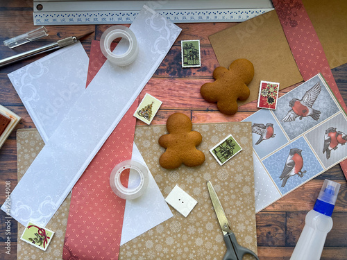 Scrapbooking set on the  table and gingerbread photo