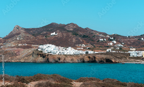 Fotografie, Obraz Naxos town view, blue sea, white greek buildings, sunny vacation day, tourism co