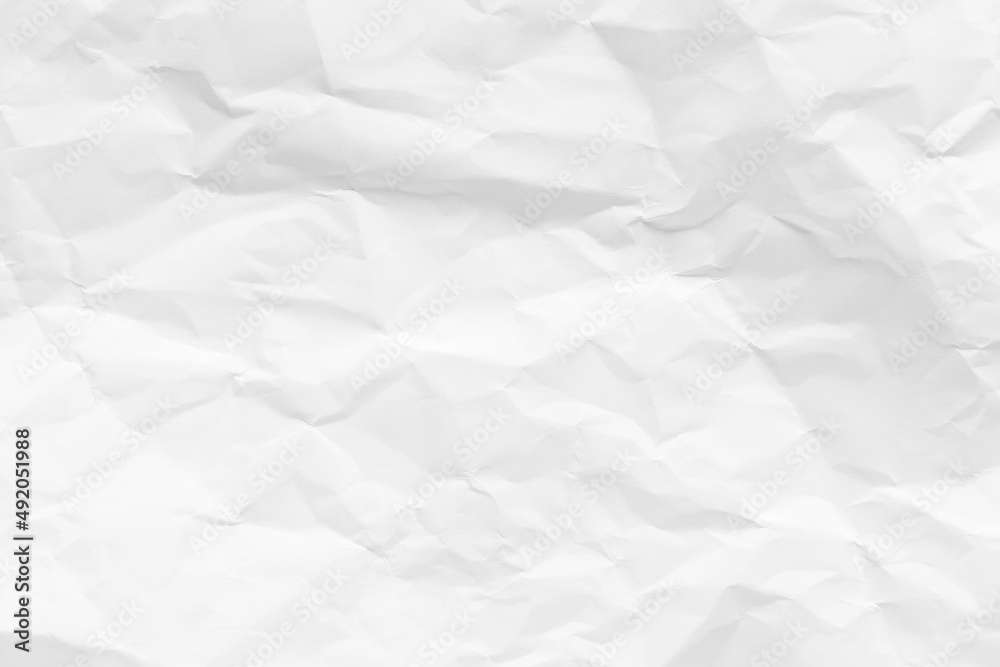 Fototapeta premium White crumpled paper texture background.