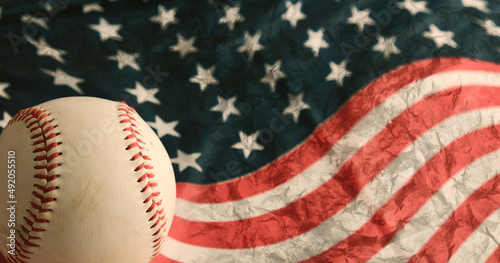 Baseball ball with American flag grunge texture background for patriotic sport concept.