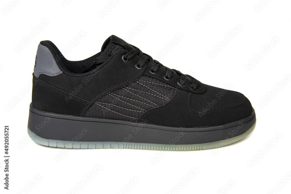 Sport black running sneakers shoes isolated on the white background Sport black running sneakers shoes isolated on the white background