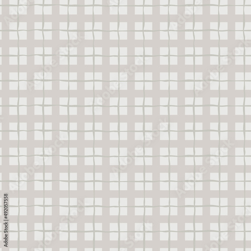 Seamless checkered repeating pattern with hand drawn grid. beige plaid background for wrapping paper, surface design and other design projects