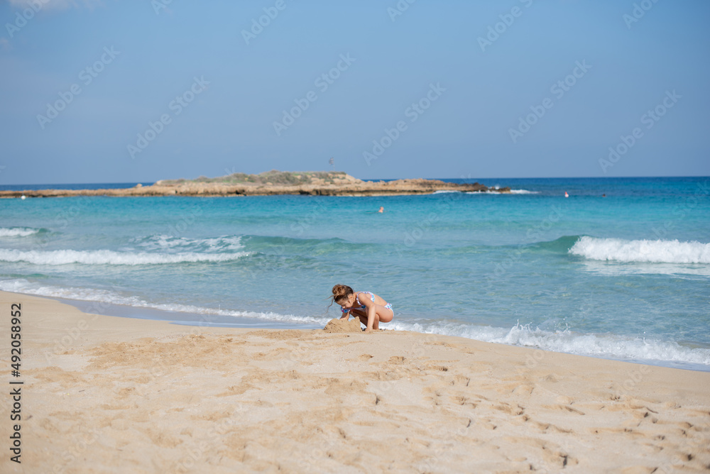 child playing on the beach child playing on the beach