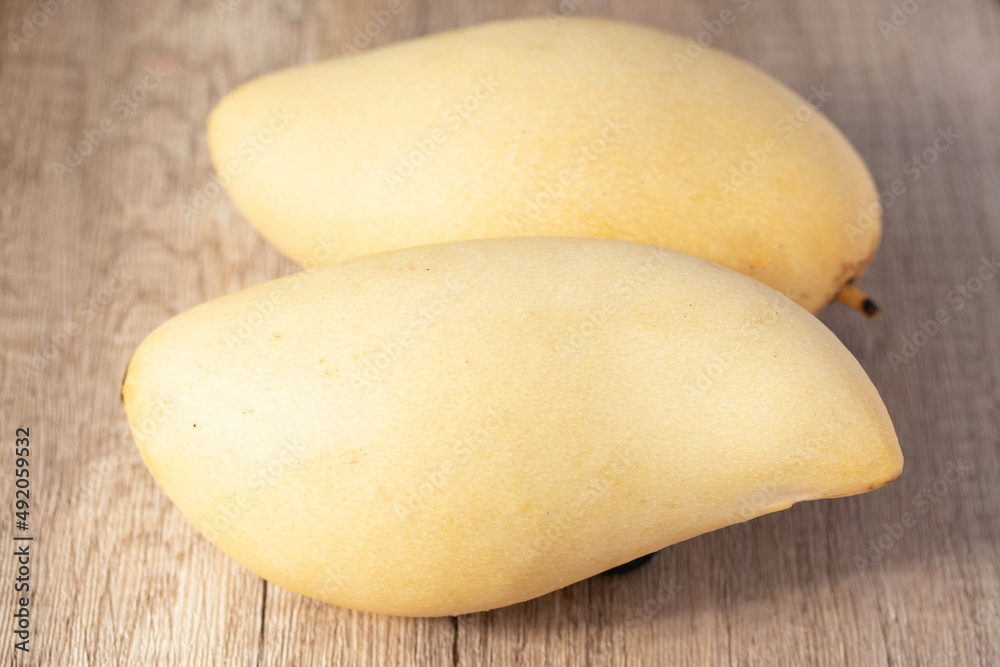 yellow ripe mango, summer fruit