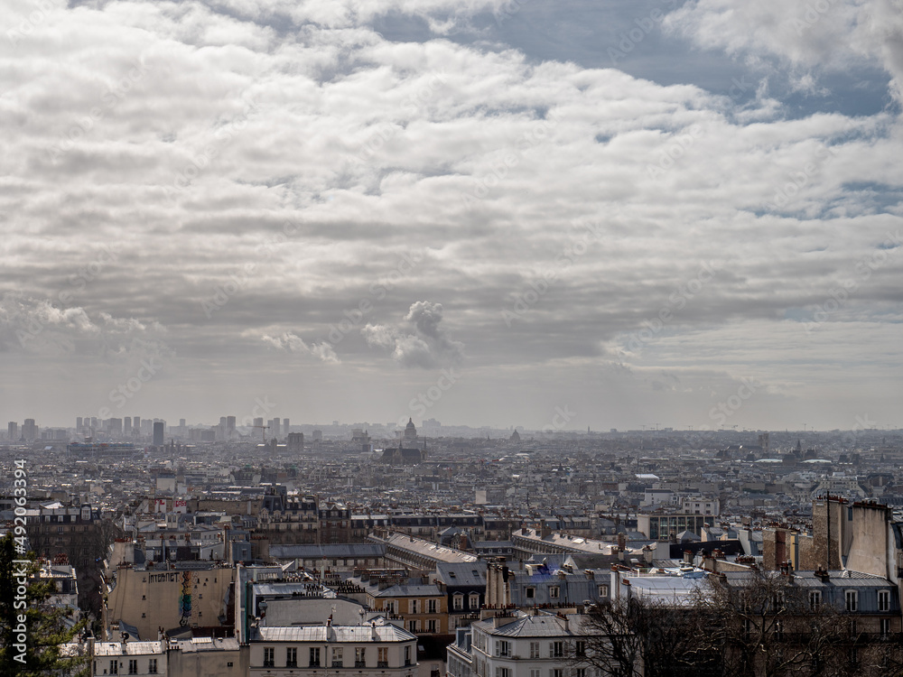 cityscape of Paris from Montmartre on a clouy day