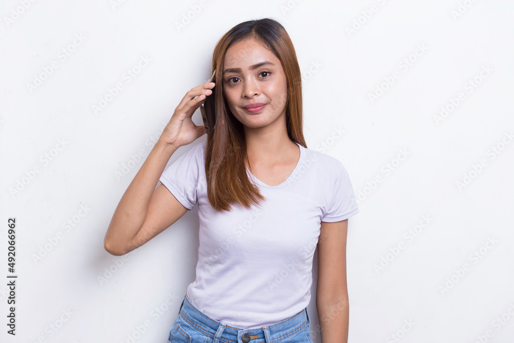 happy young asian beautiful woman using mobile phone isolated on white background
happy young asian beautiful woman using mobile phone isolated on white background