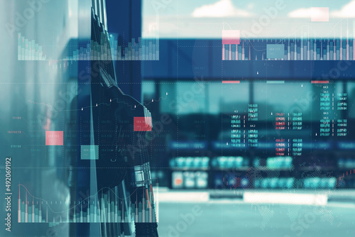 Gas station with fuel dispensers on technological background. Graph of rising prices for gasoline and fuel. © vadish
