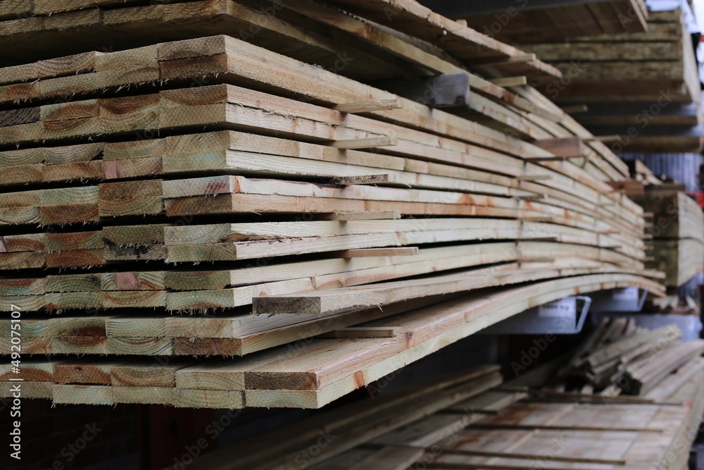 Fototapeta premium Stacked timber in yard