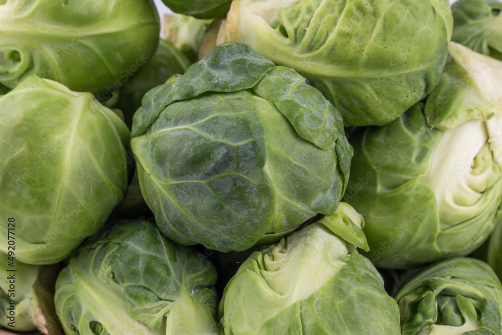 Fresh organic Brussels sprouts background. Fresh organic Brussels sprouts background.