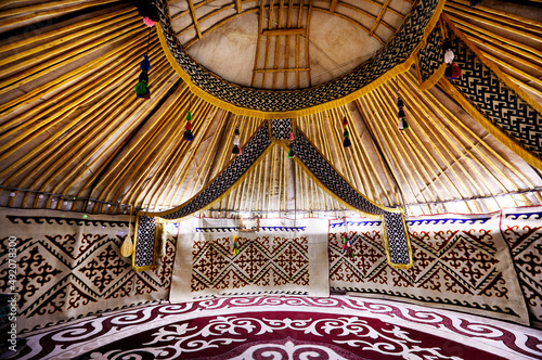 Ethnic nomadic yurt house interior in Kazakhstan photo