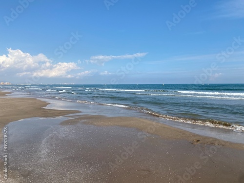 Seaside, half-term break, winter sun, beach, vacation, child playing, sand, sea view, Spain, Valencia beach, sunny, October
