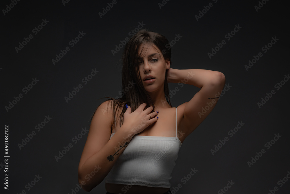 Posing seductivly while touching herself Posing seductivly while touching herself