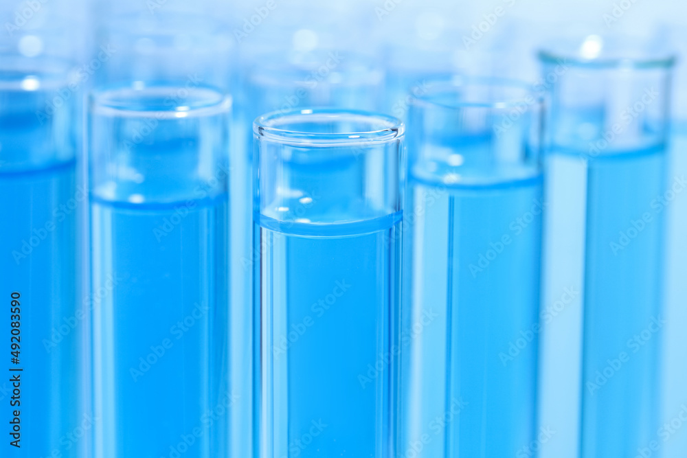 Test tubes with light blue reagents, closeup. Laboratory analysis Test tubes with light blue reagents, closeup. Laboratory analysis