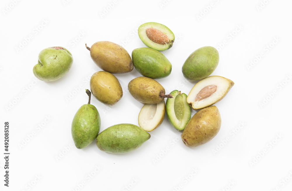 Obraz premium green raw and boil olive fruit isolated on white background, top view