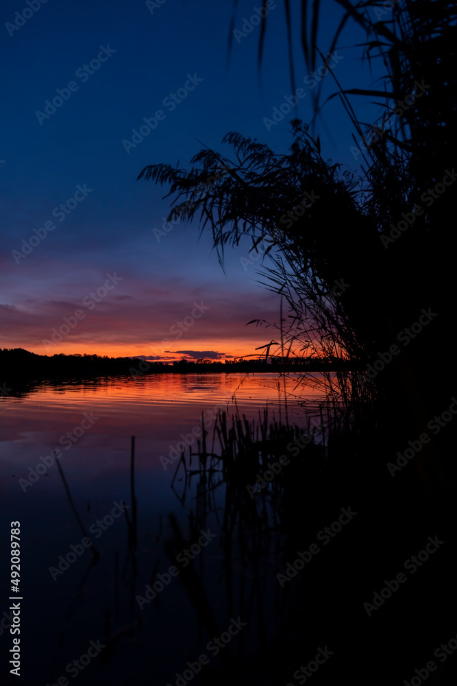 Sunset over the pond Rezabinec near Pisek town, Southern Bohemia, Czech Republic Sunset over the pond Rezabinec near Pisek town, Southern Bohemia, Czech Republic