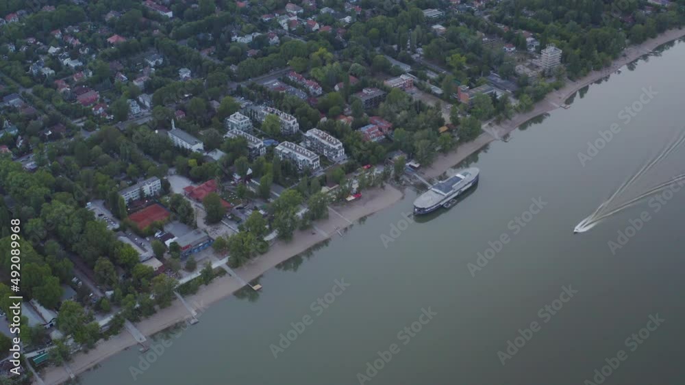 Boat creating waves on Danube, Hungary Boat creating waves on Danube, Hungary