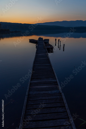 fishing boat at pier on Jenoi pond near Diosjeno, Northern Hungary