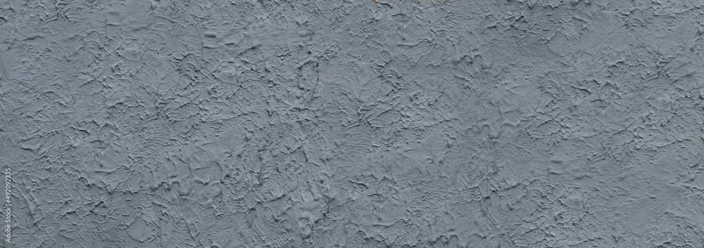 Obraz premium rough decorative plaster wall covering pattern for background