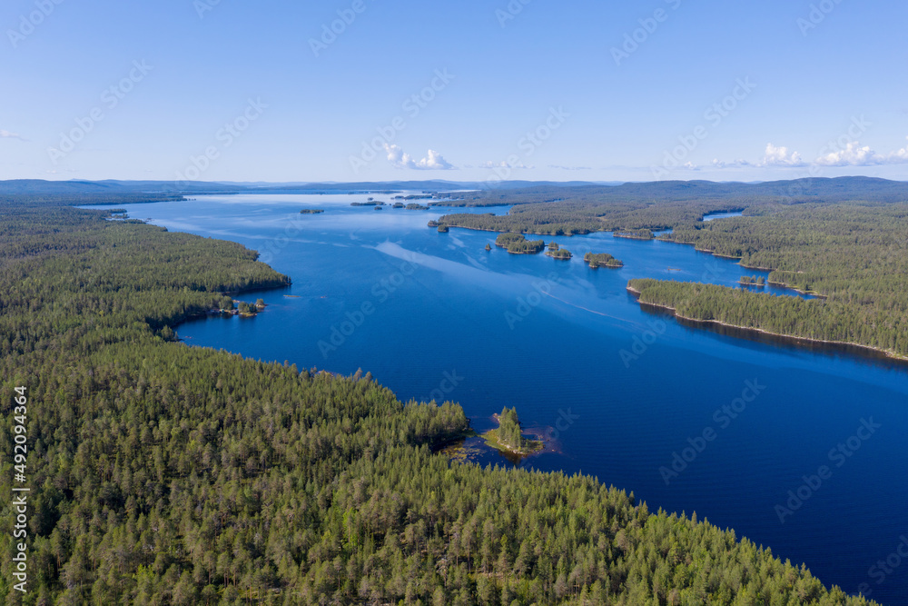 Bird’s eye view of Iovskoye reservoir on sunny summer day. Murmansk Oblast, Russia.
