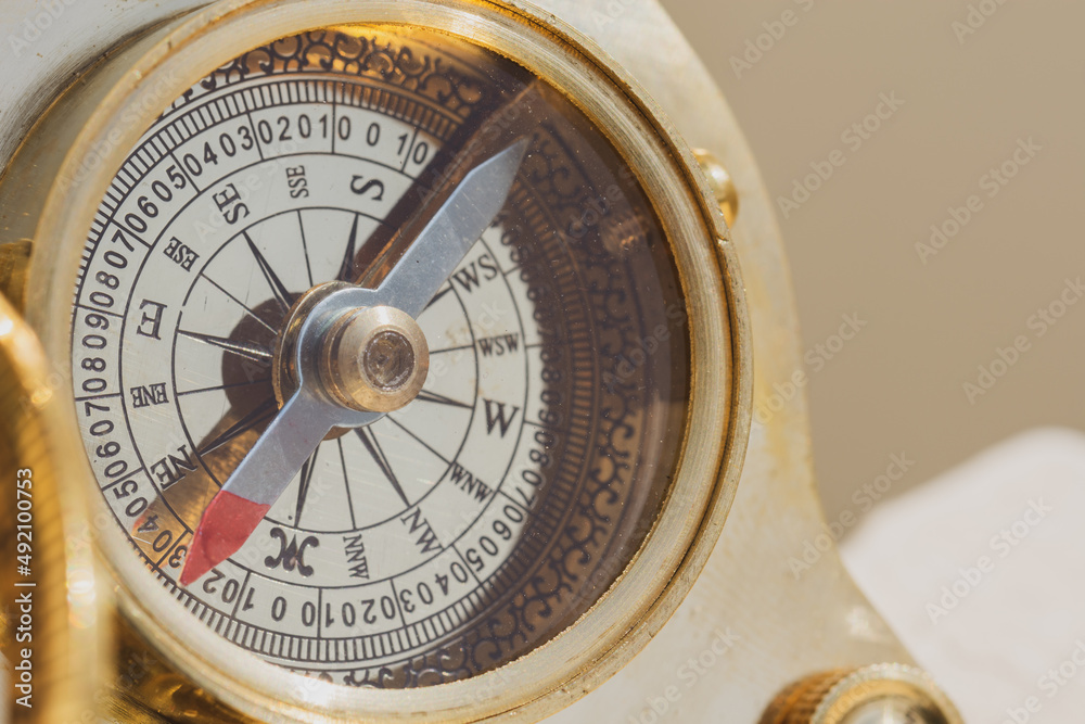 Detail of an antique maritime bronze solar compass Detail of an antique maritime bronze solar compass