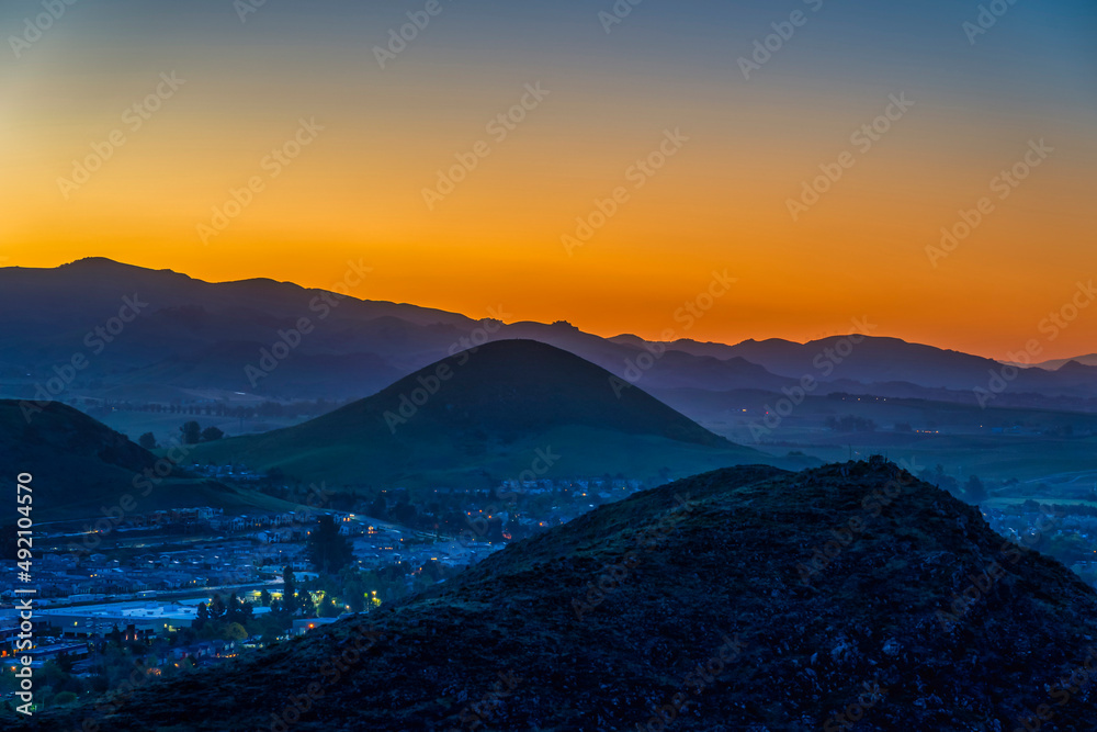 Hills at Sunset, sunrise over City, Town