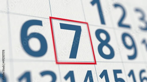 Calendar with marked 7 day of the month close-up photo