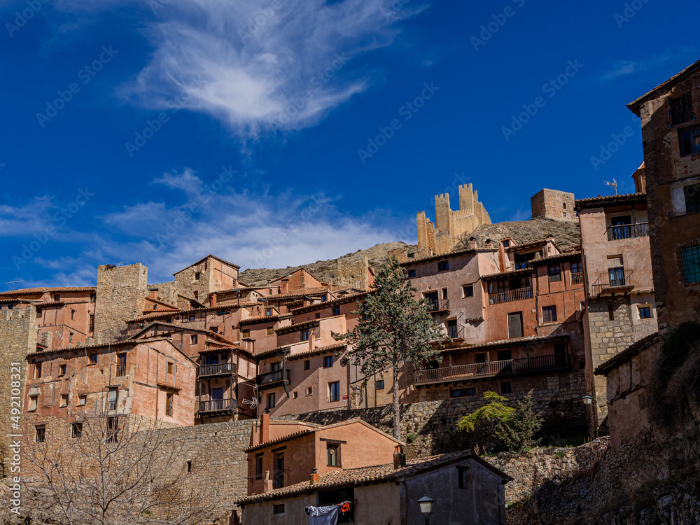 landscape of the medieval town of Albarracin in the province of Teruel in Aragon, Spain. Albarracín medieval town in Spain, stone houses, walls, churches and narrow alleys.