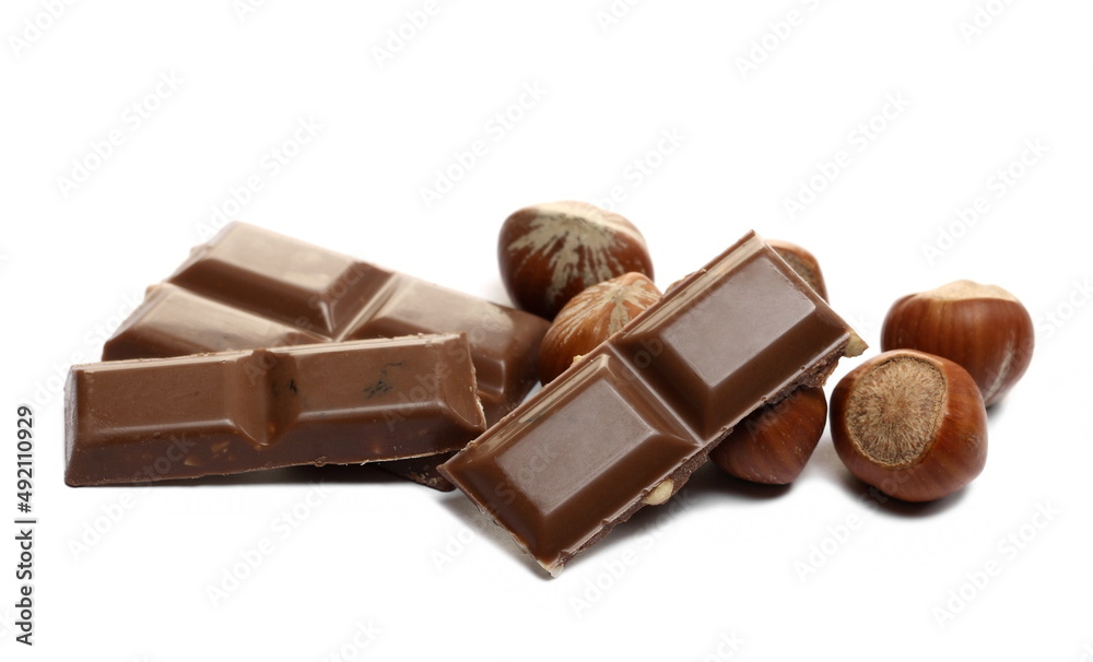 Chocolate bars with hazelnut and raisins isolated on white Chocolate bars with hazelnut and raisins isolated on white