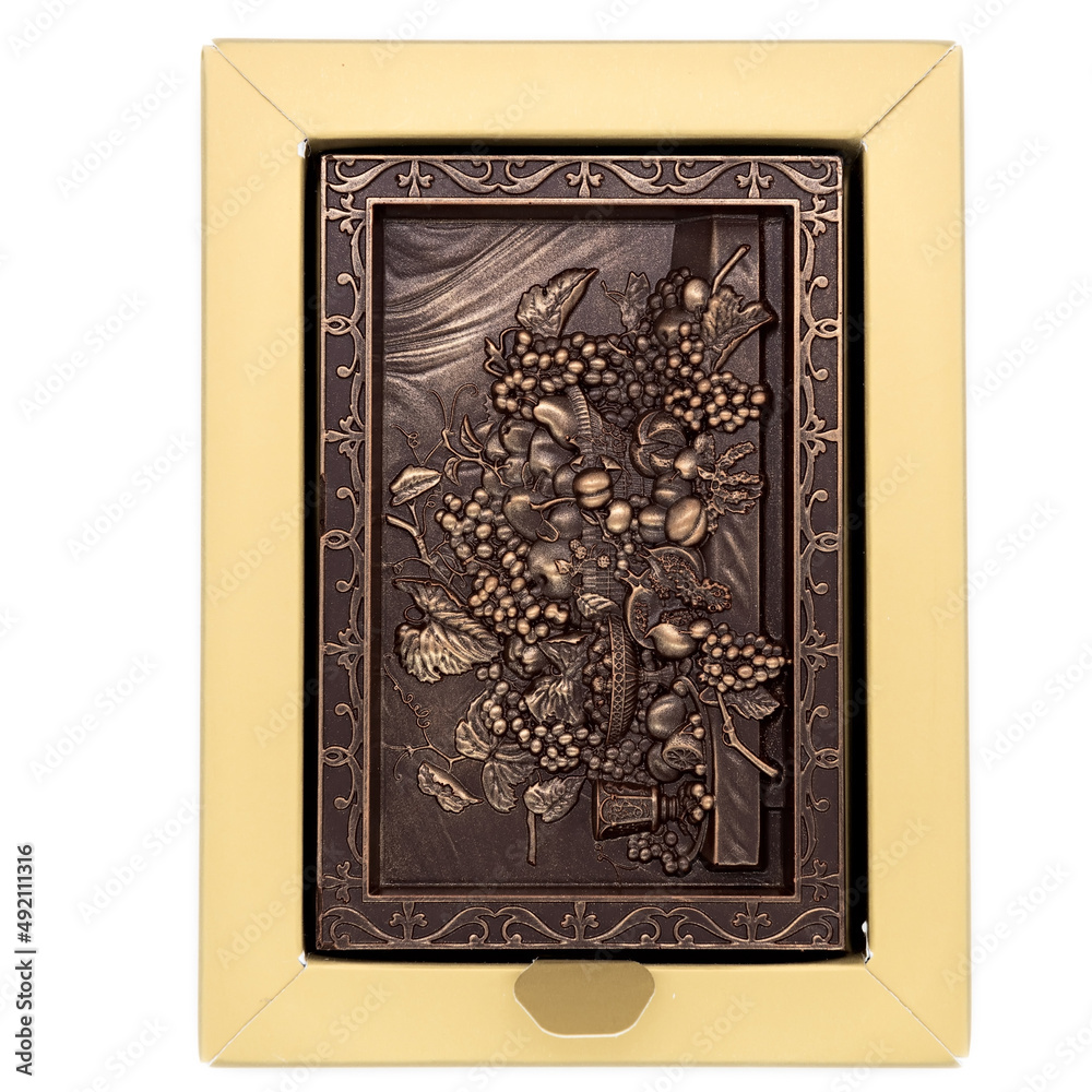 Naklejka premium Three-dimensional drawing of flowers on chocolate in a gift box