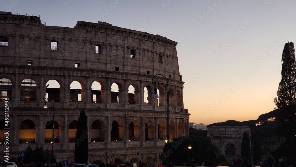 sunset at the colosseum in rome