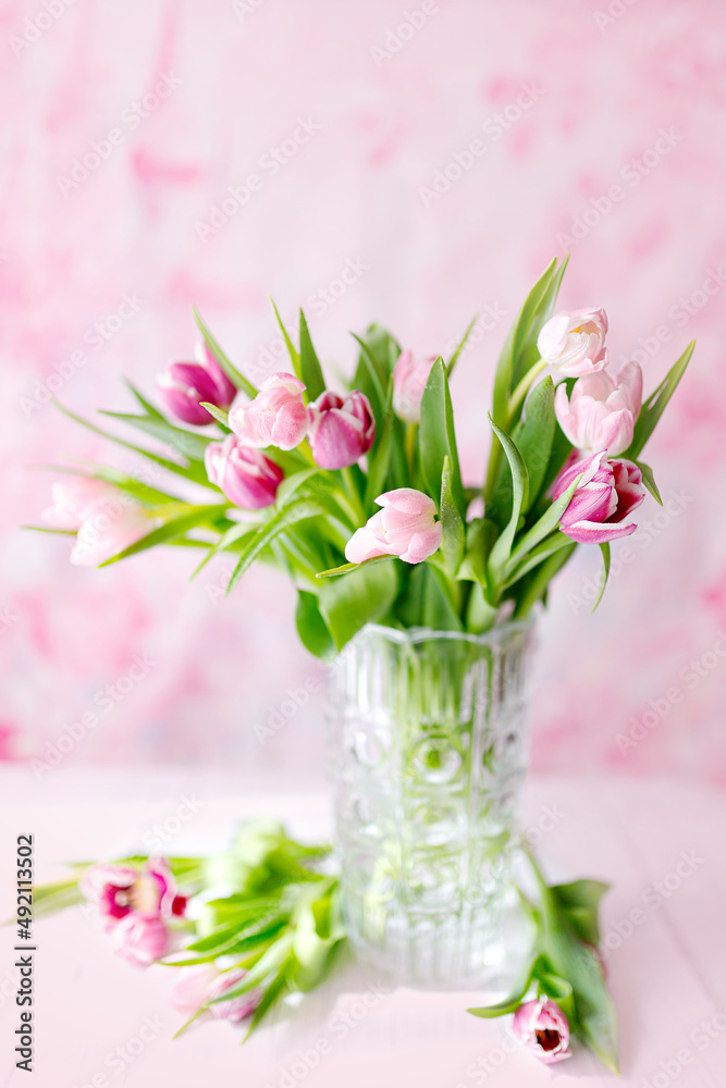 spring tulips on pink background. Greeting card for mothers day