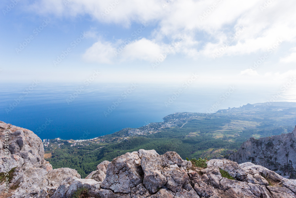 Panoramic view of the city of Yalta from the Ai-Petri cliff. Crimean nature. The Republic of Crimea. Panoramic view of the city of Yalta from the Ai-Petri cliff. Crimean nature. The Republic of Crimea.