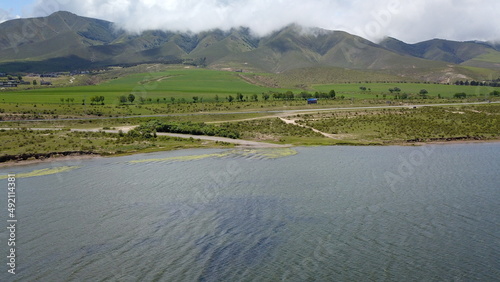 beautiful landscape with green mountains and lake in northwest Argentina 