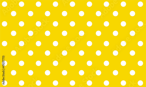 seamleass polka dots pattern with yellow vintage background