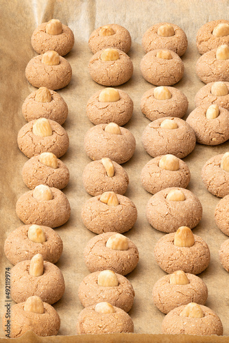 Freshly baked almond cookies in a tray