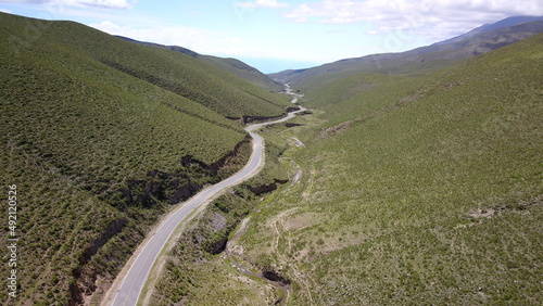 beautiful mountain road in green landscape in northwest Argentin