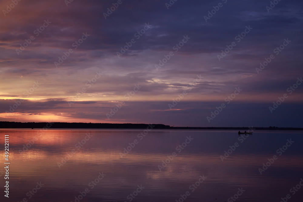 Lake Svityaz, sunset on the lake, the rays of the sun in the sky, national reserve, Ukraine nature, Ukrainian places