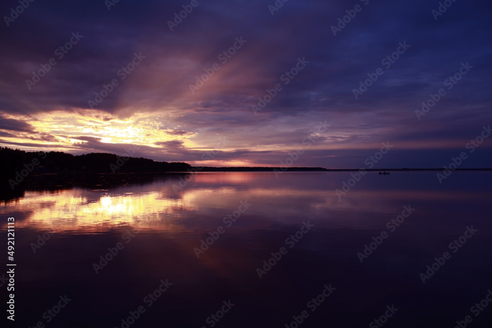 Lake Svityaz, sunset on the lake, the rays of the sun in the sky, national reserve, Ukraine nature, Ukrainian places