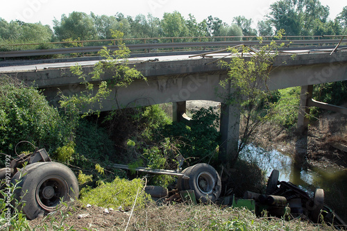 Fotografija Truck with a trailer crashed into the river from the bridge
