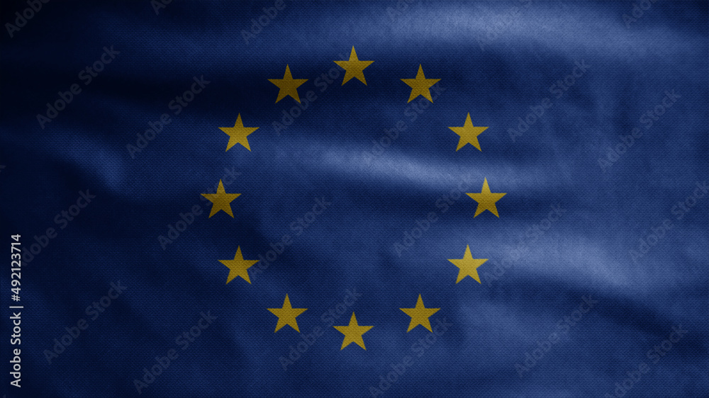 European Union flag waving on wind. Close up of Europe banner blowing soft silk. European Union flag waving on wind. Close up of Europe banner blowing soft silk.