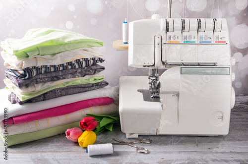 Overlock sewing machine and fabric stack. Tailor's Workflow photo