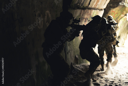 Built up tunnel channel having sneaky squad of commandos. High quality photo © PoppyPix