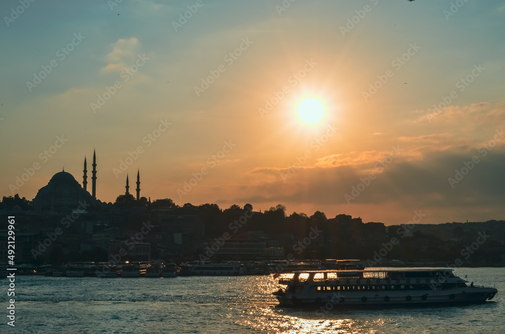 Istanbul silhouette with sunset light, mosques