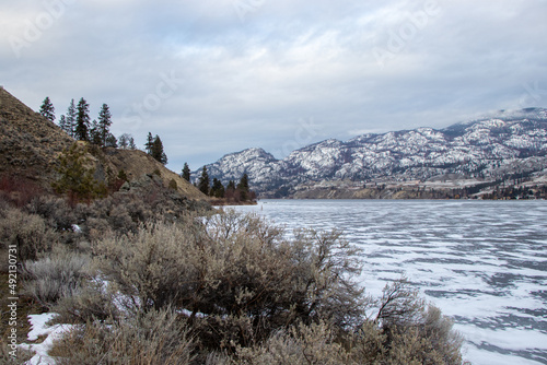 frozen lake in winter in the mountains