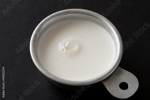 Half and Half Cream in a Measuring Cup 