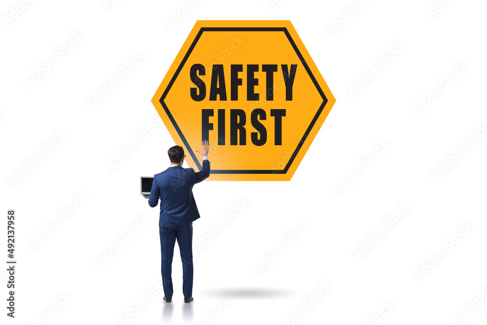 Safety first concept with businessman Safety first concept with businessman