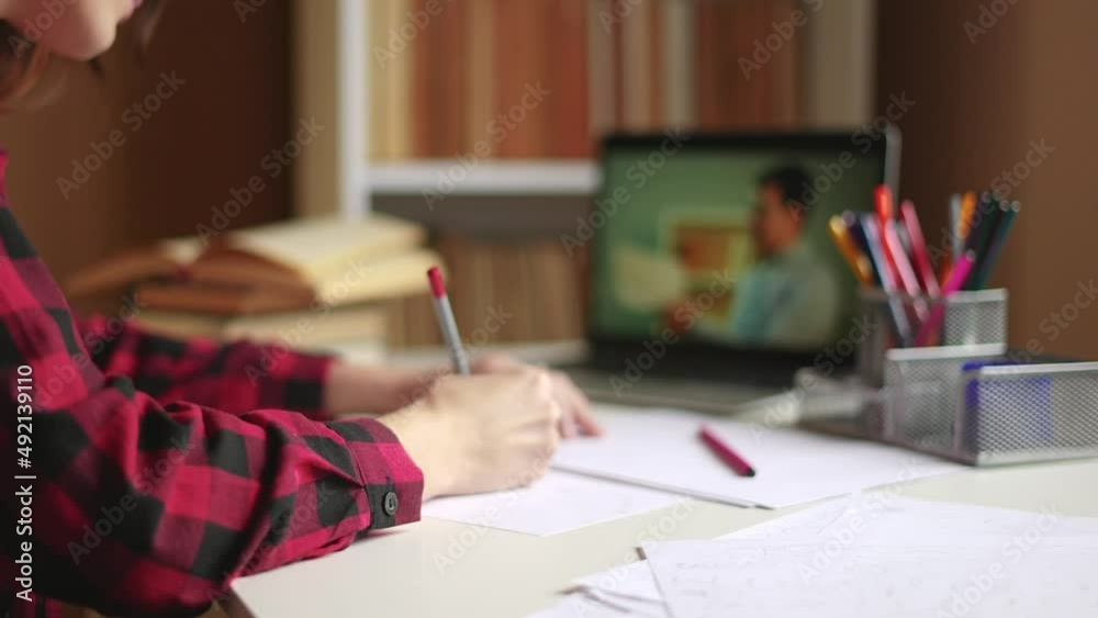 distance learning online education. girl student studying at home on a