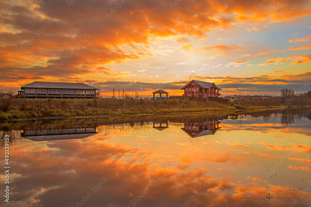 beautiful sunset painted the sky over the lake with bright colors