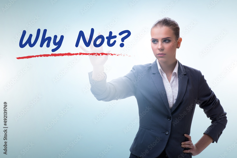 Businesswoman asking the question why not Businesswoman asking the question why not